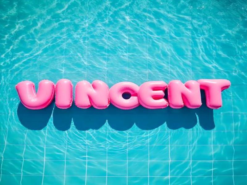 firefly-pink-inflatable-ring-floating-in-pool.-in-the-reference-image